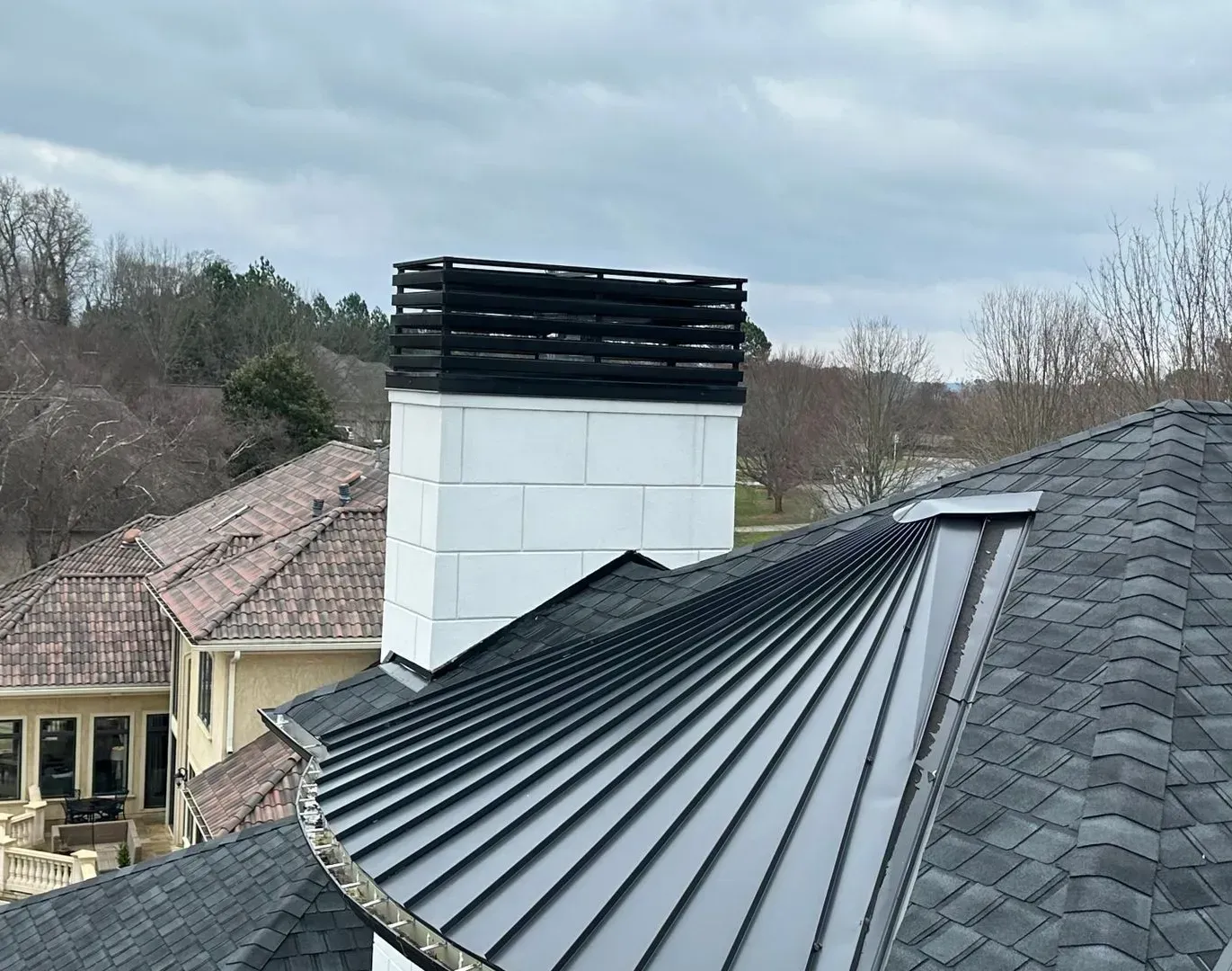 A roof with a chimney on top of it