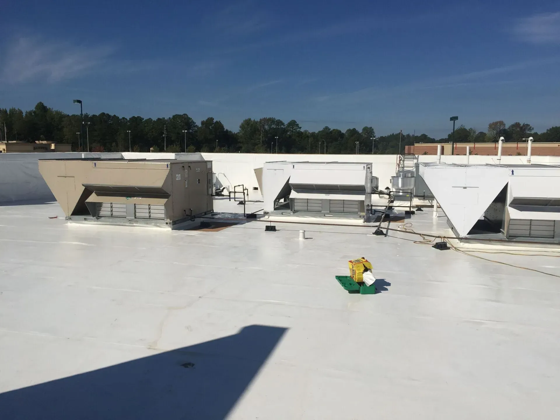 The roof of a building with a white roof