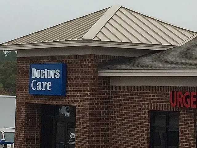 A brick building with a sign that says doctors care