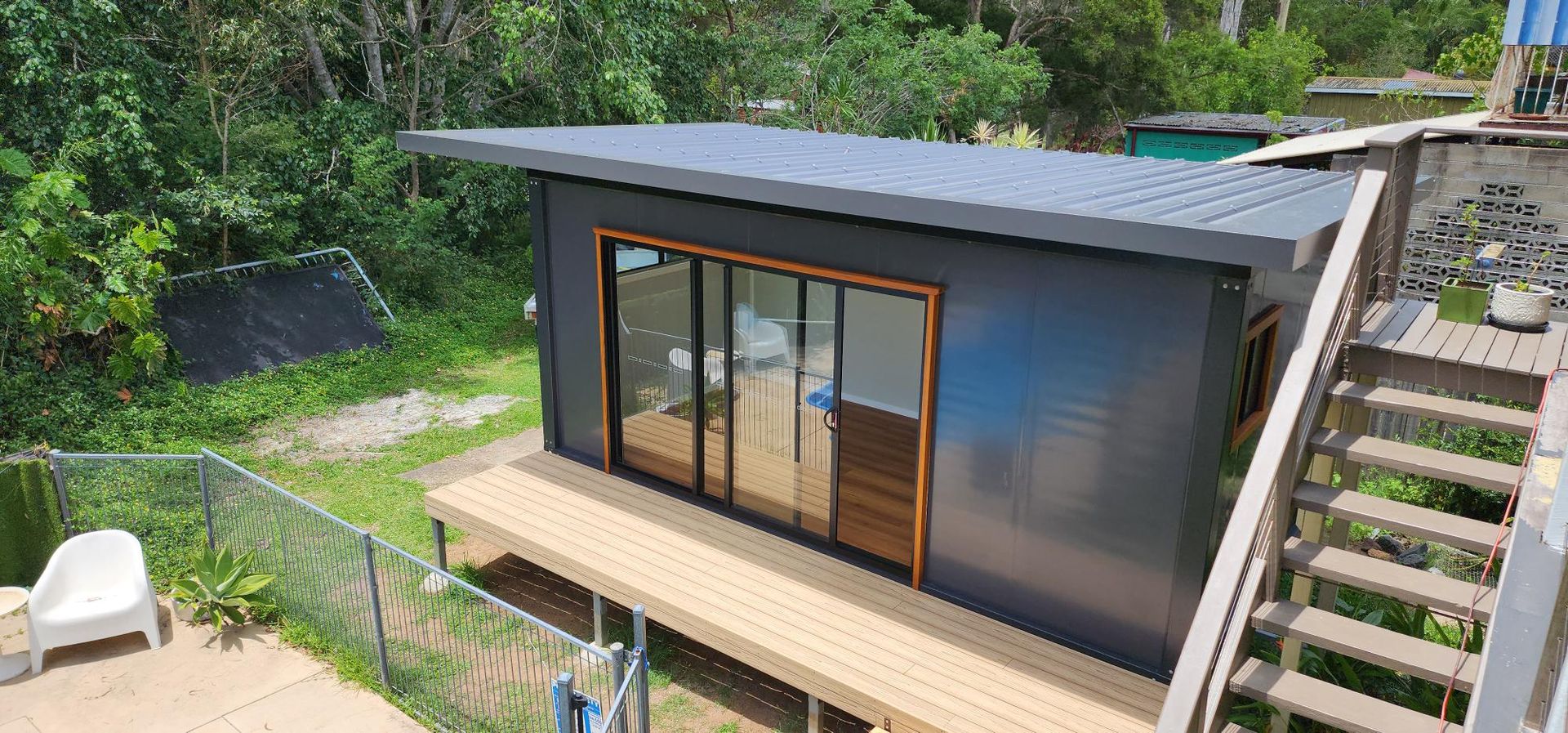 An Aerial View of A Small House with Stairs Leading up To It — Alternative Modular Home In Toowoomba City, QLD