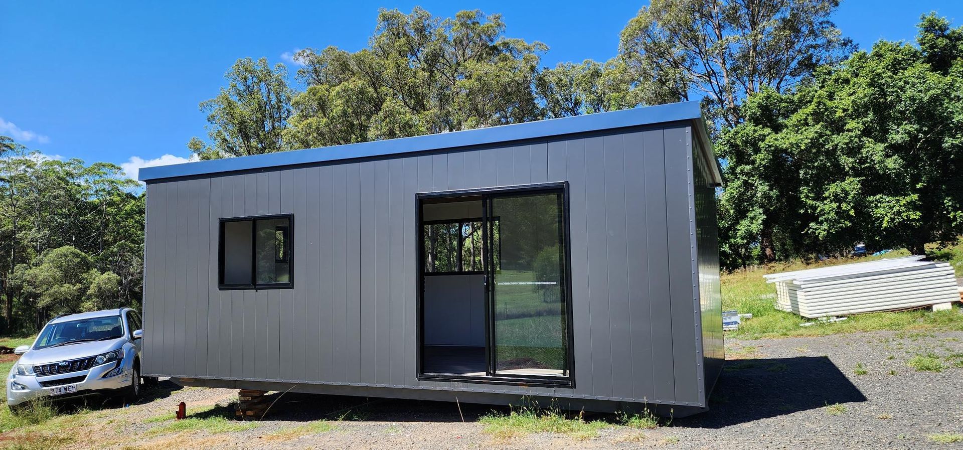 A Small House with A Car Parked in Front of It — Alternative Modular Home In Toowoomba City, QLD