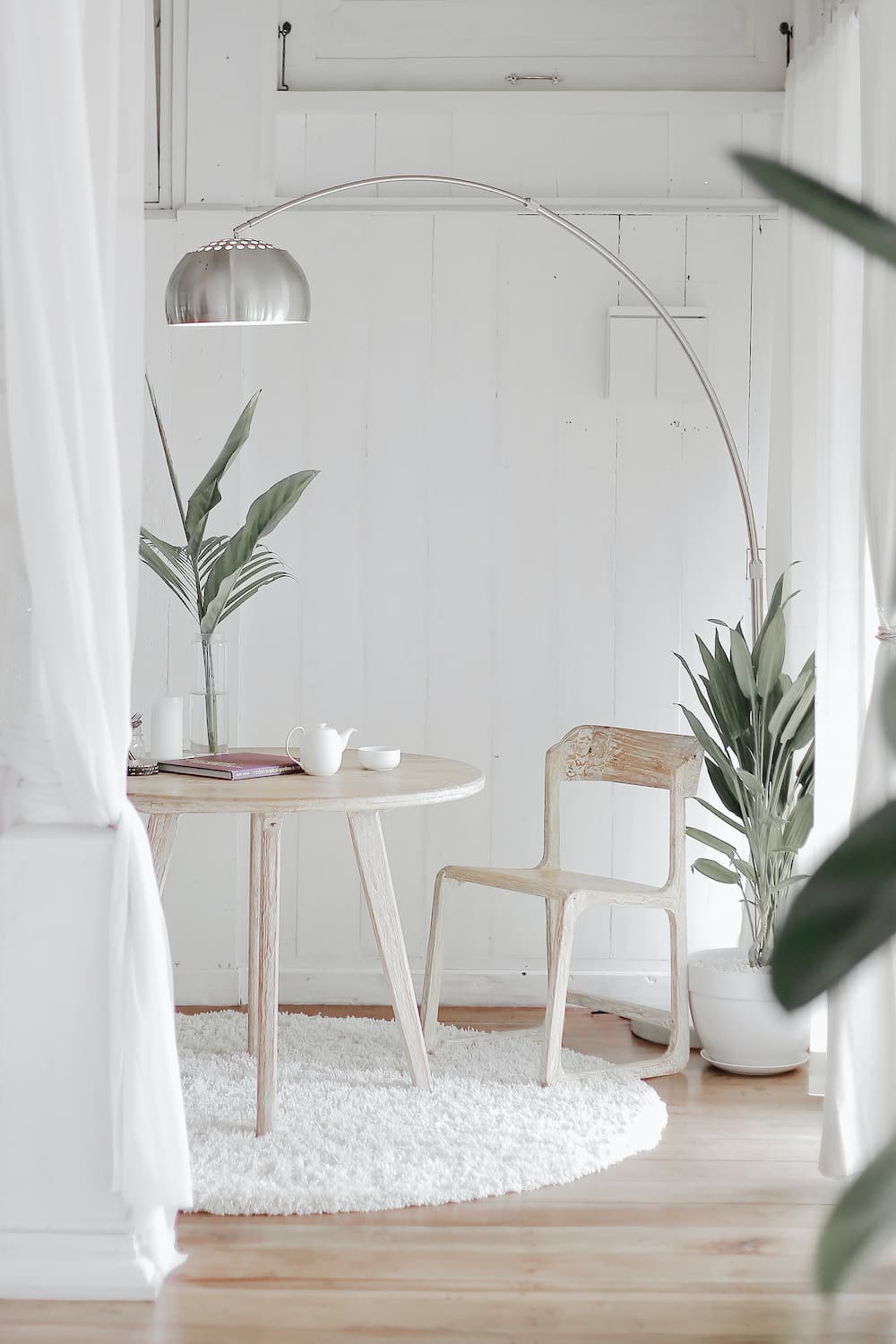 White Minimalist Table And Chair — Alternative Modular Home In Toowoomba City, QLD