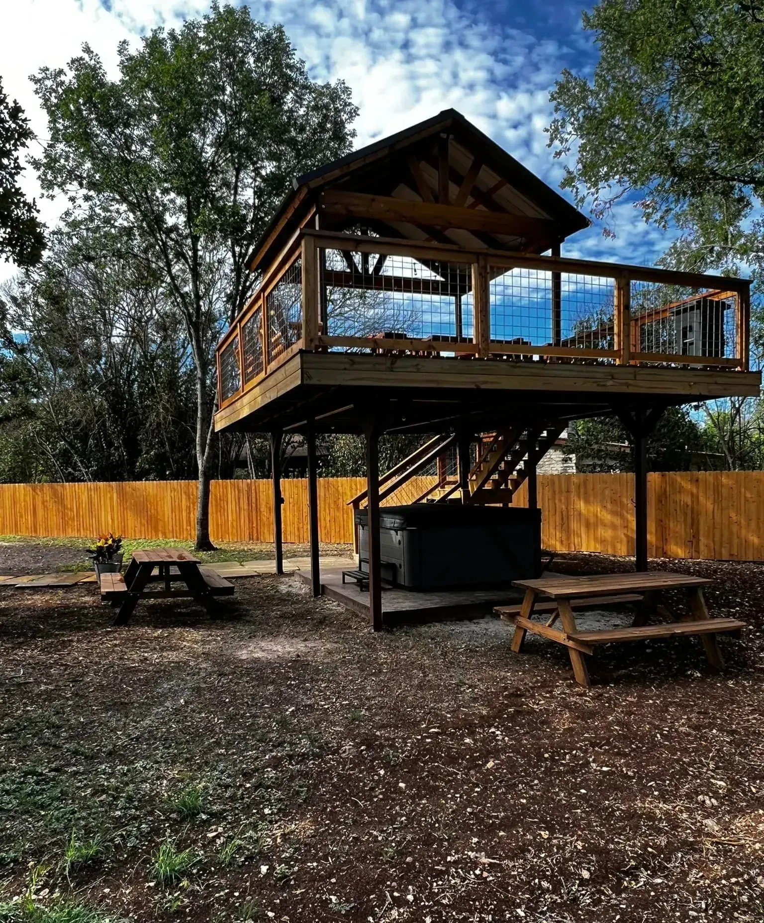 Working on a wooden deck with a view of the Texas Hill Country.