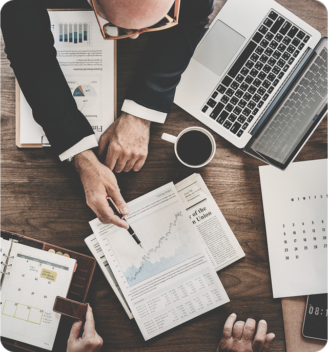 Person typing on a laptop with transparent checklist icons overlaid, one marked complete.