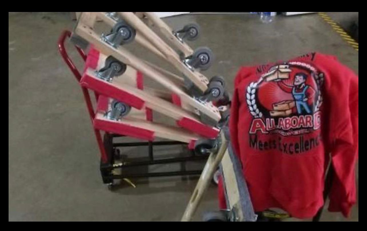 A red shirt that says alaska on it