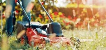 Lawn Maintenance — Lawn Mower Cutting Grass in Belleville, IL