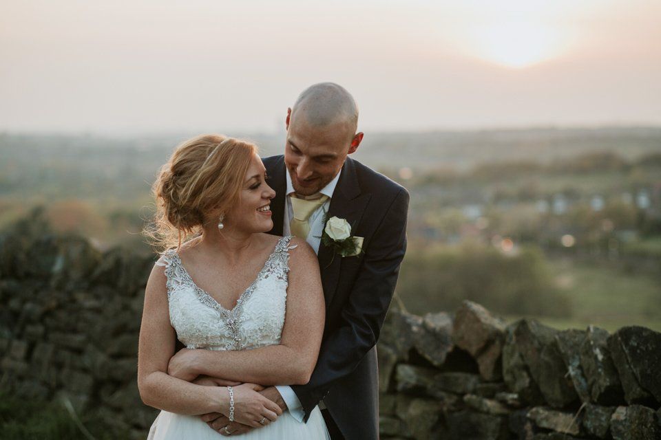 sunset wedding portrait photograph of bride and groom at the white hart lydgate