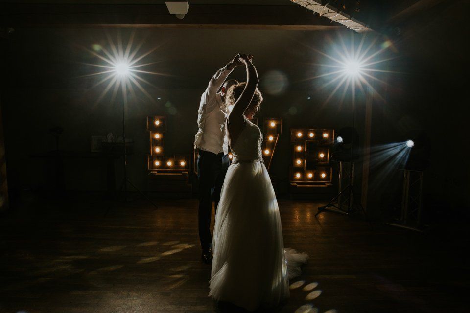 bride and groom having first  dance at the white hart lydgate wedding