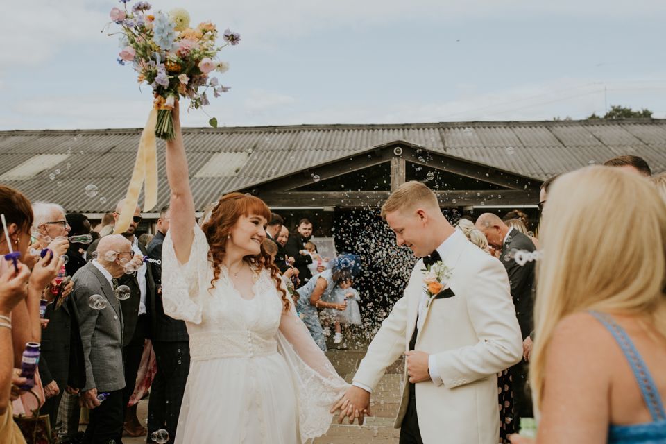 Bride and groom confetti photo