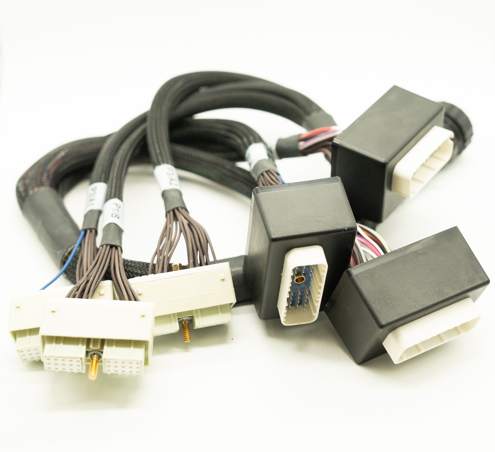 A bunch of wires and connectors on a white surface