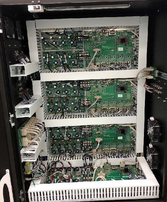 The inside of a machine with a lot of electronic components