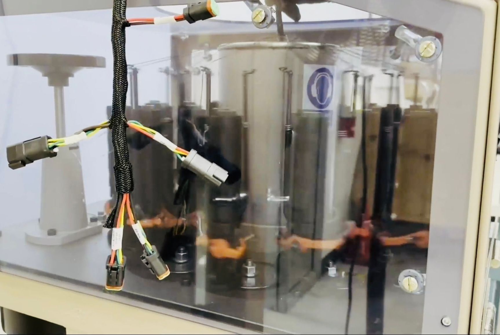 A machine with a lot of wires coming out of it