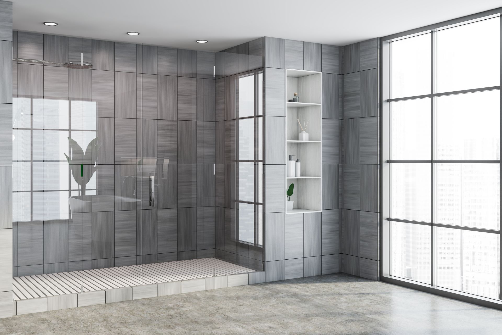 Modern gray bathroom with tiled shower, glass doors, and a built-in shelf by large windows