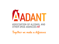 Logo for the Association of Alcohol and Other Drug Agencies NT. Red, orange and yellow text with a map of the NT.