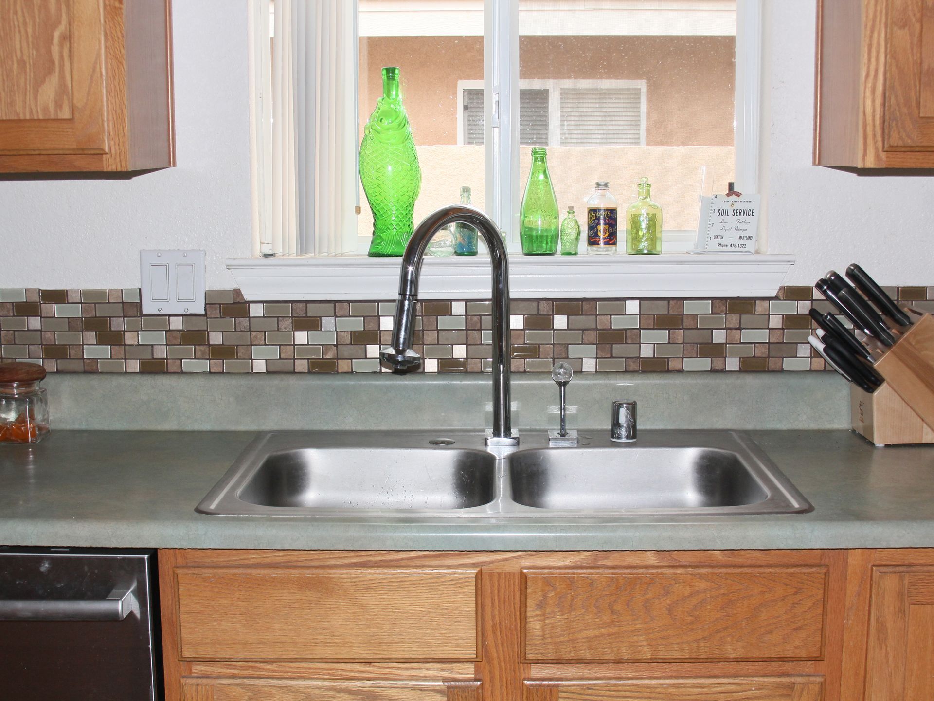 Photo of sink with Gemtone Hardware Faucet