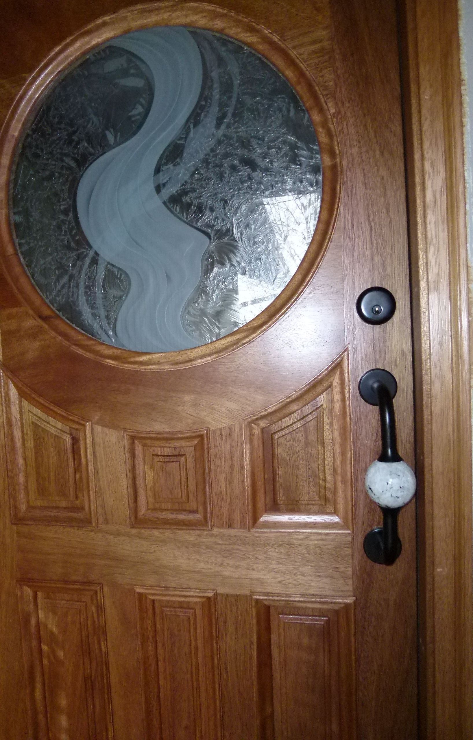 Crystal Quartz Entry Pull and Matching Deadbolt in Matte Black