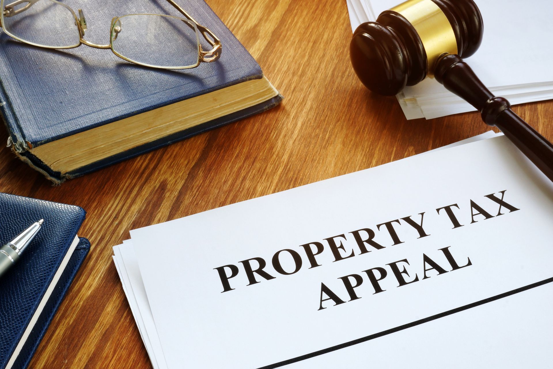 Property Tax Appeal Documents and Wooden Gavel | Chicago, IL | Park & Longstreet P.C.