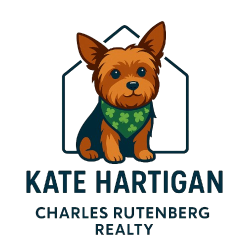 Logo: Yorkshire Terrier in a house outline, wearing a green shamrock bandana; "Kate Hartigan, Realtor."