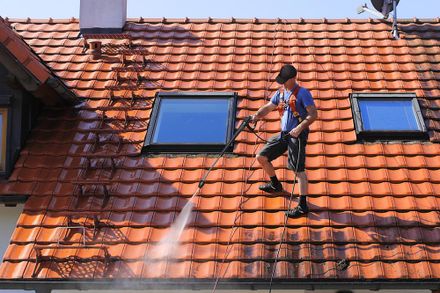 Man Cleaning Roof with Pressure Washing — Crestwood, KY — Advanced Cleaning Services