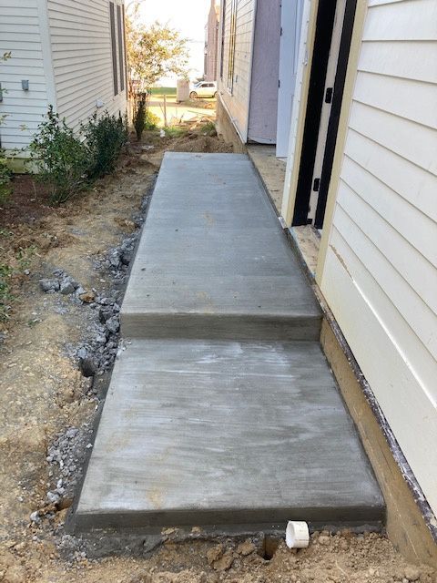 A concrete walkway in Brandon, MS by Scott Meadows Construction Co. 