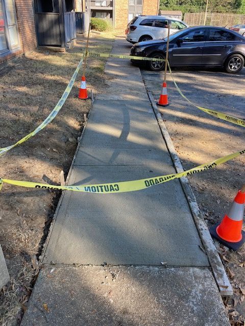 A concrete sidewalk in Brandon, MS by Scott Meadows Construction Co. 