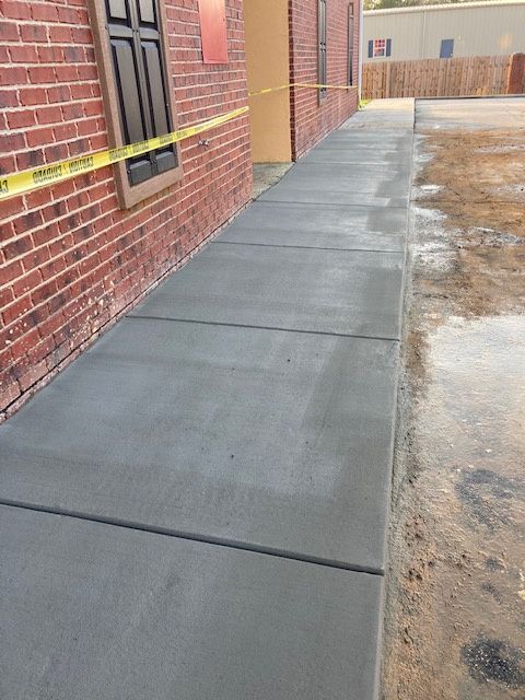A concrete sidewalk in Brandon, MS by Scott Meadows Construction Co. 
