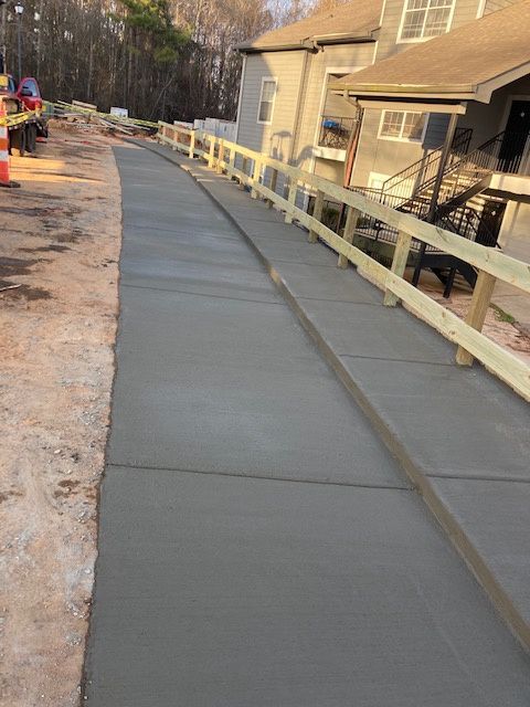 A concrete sidewalk in Brandon, MS by Scott Meadows Construction Co. 
