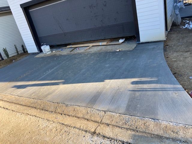 A residential concrete driveway in Brandon, MS by Scott Meadows Construction Co. 