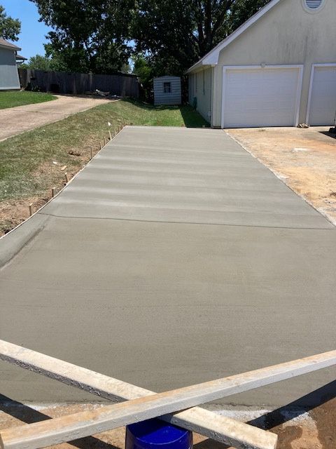 A residential concrete driveway in Brandon, MS by Scott Meadows Construction Co. 