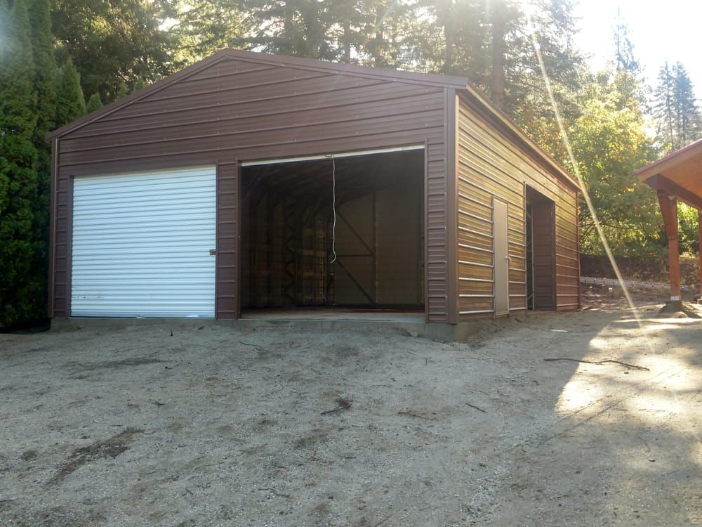 A brown garage with a white garage door