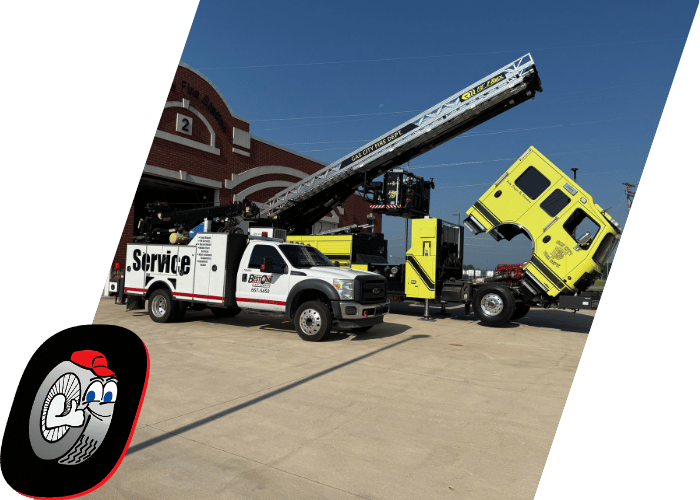 Utility service truck supporting maintenance on a raised hi rail vehicle.