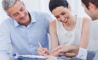 Couple Signing Contract - Insurance Services in Rockwell, NC