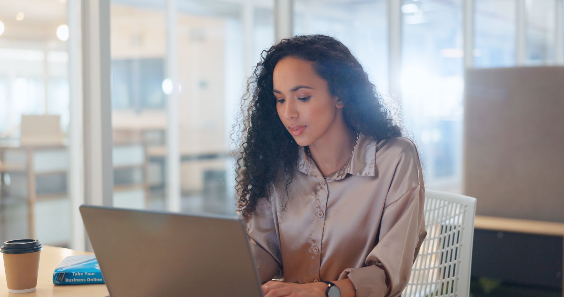 Woman on Laptop for Online Booking — Auckland, NZ — The New Zealand House Inspection Company