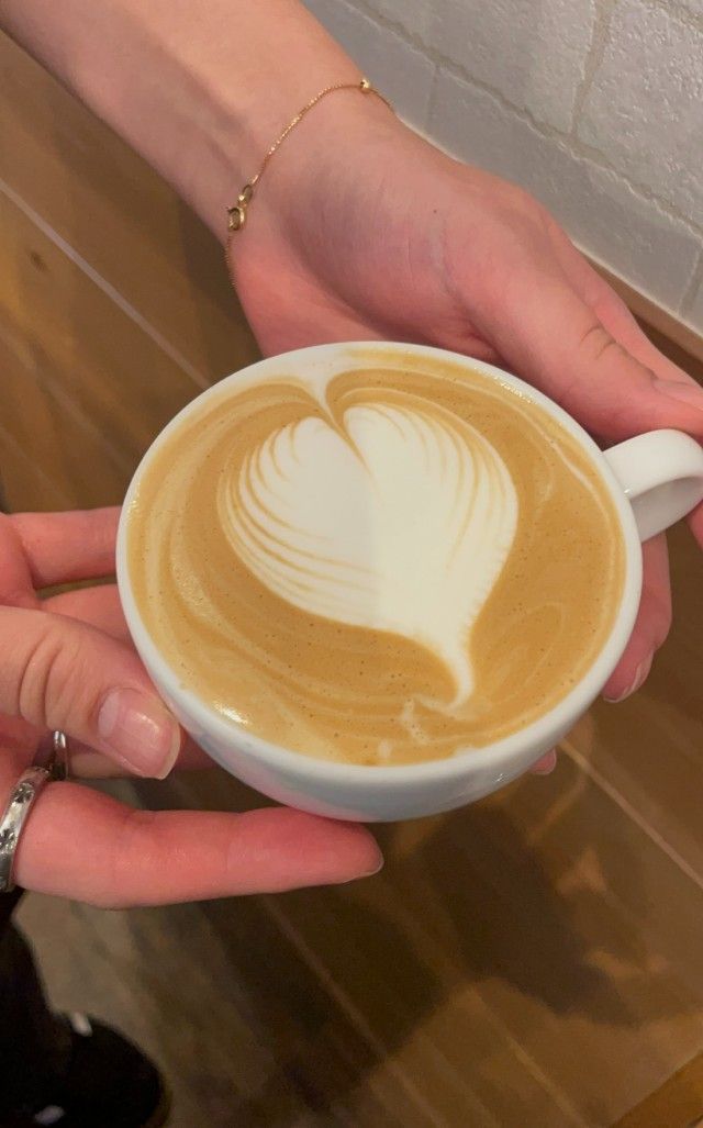 Coffee or cappuccino with heart design.
