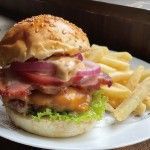 Burger Thumbnail - a picture of a hamburger on a plate with French fries