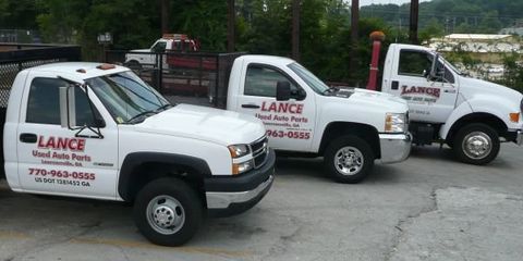 White Trucks Parked Side By Side — Lawrenceville, GA — Lance Used Auto Parts