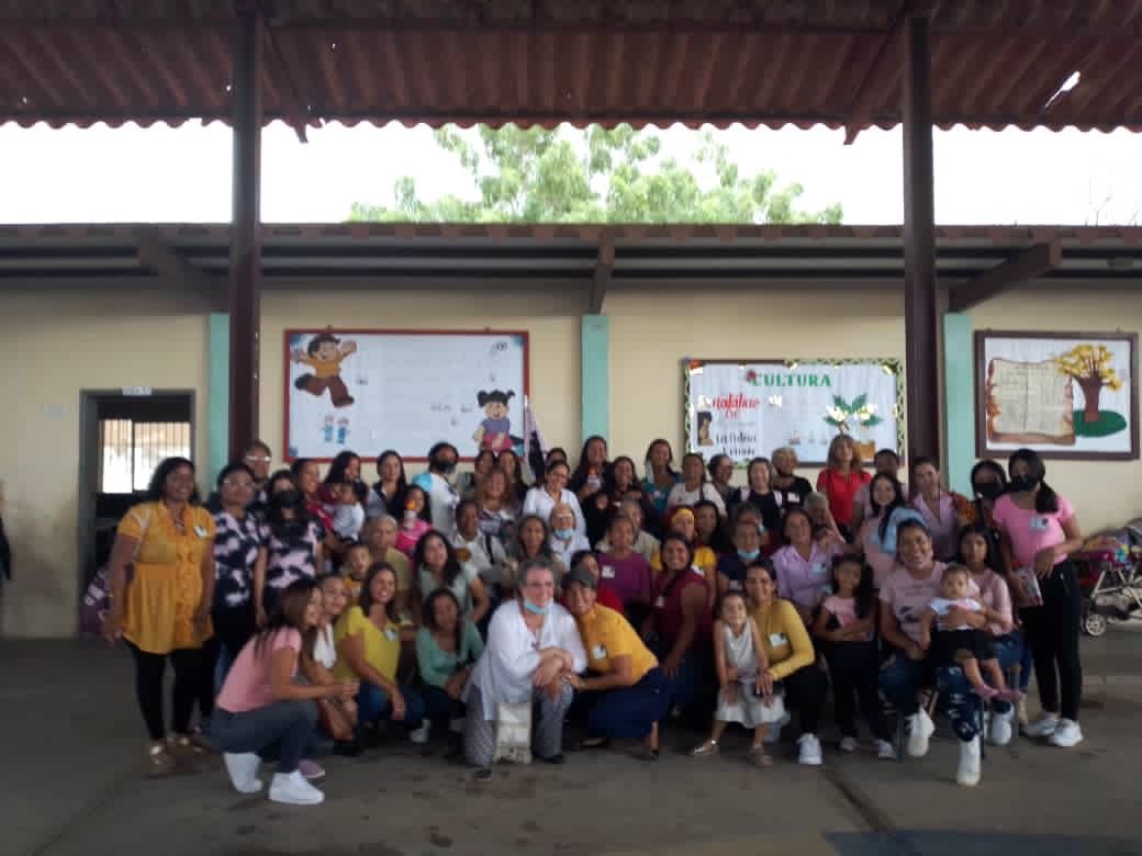 A large group of people are posing for a picture
