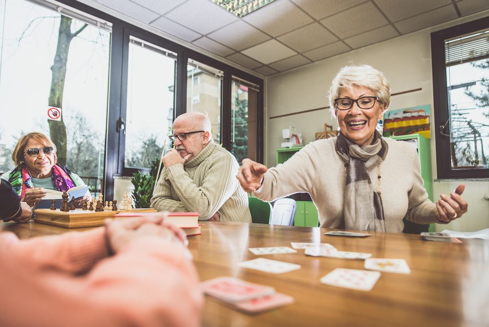 Residents playing card games together.