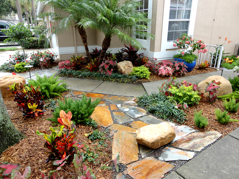 Eden Nursery | Clearwater, FL | Landscaping with Stone Walkway, Rocks, Plants, Flowers, Palm Trees