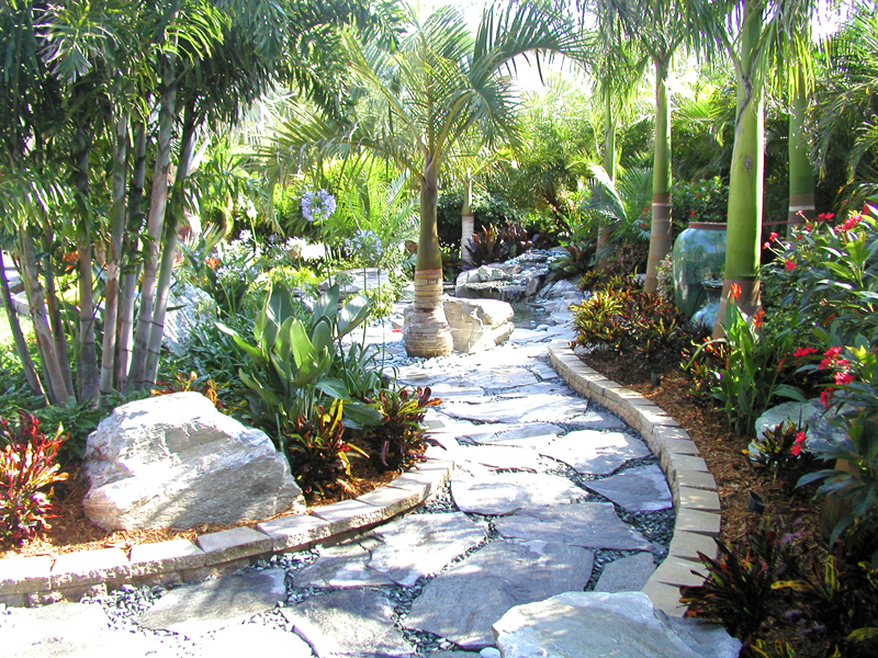 Eden Nursery | Clearwater, FL | Landscaping with Trees, Flowers, Rocks, Plants, Palm Trees, and Stone Walkway