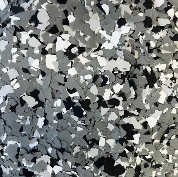 A close up of a gray , white and black marble texture