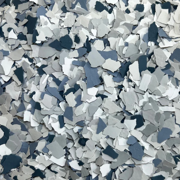 A close up of a pile of gray and white flakes