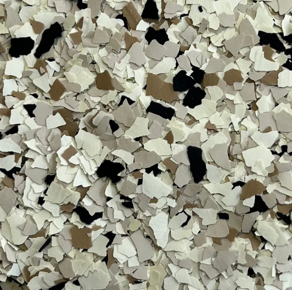 A close up of a pile of white and brown flakes