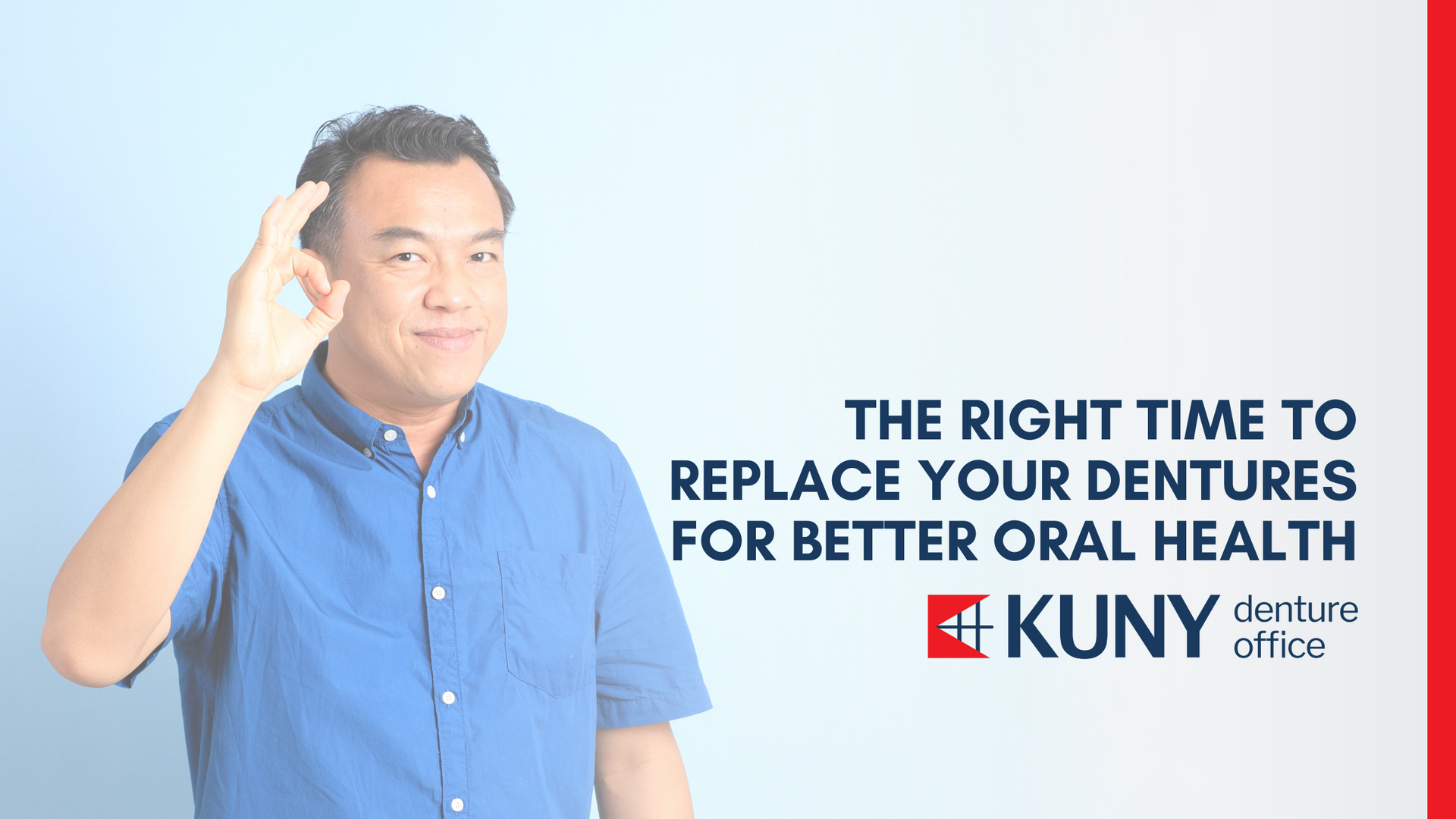 A man in a blue shirt is giving a thumbs up sign.