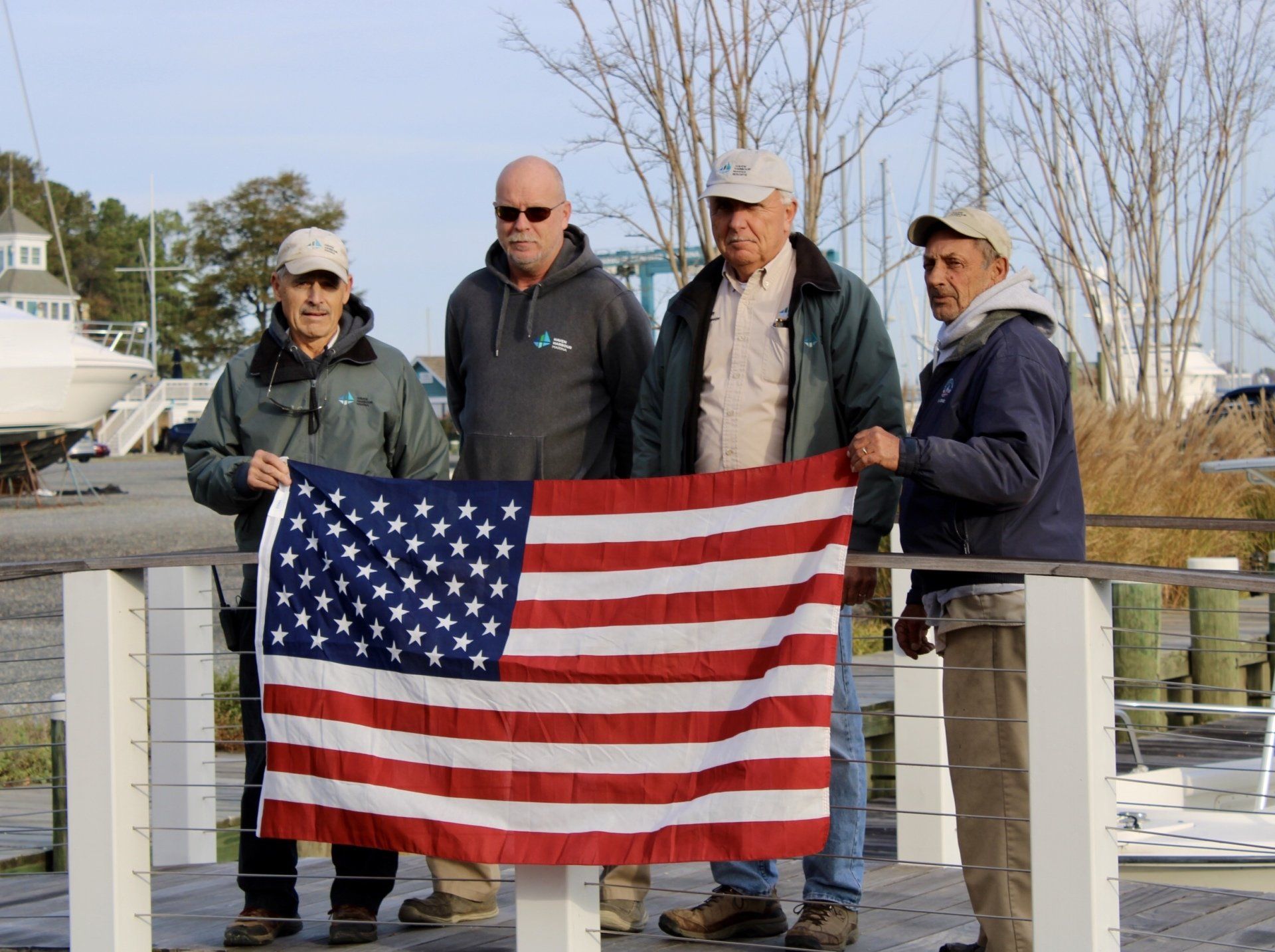 Veterans holding a United States flag
