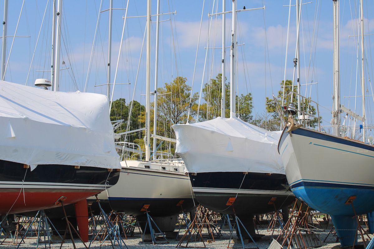 Sailboats in a boatyard on a sunny spring day