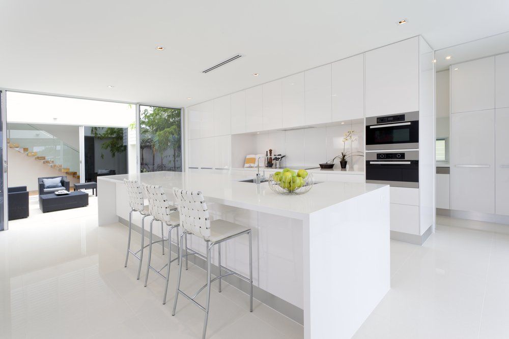 Kitchen With Stainless Steel Appliances — Kitchen Renovations in Chinderah, NSW