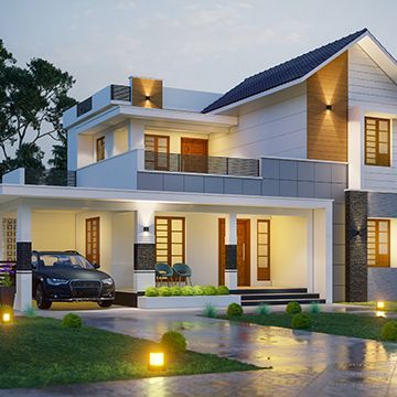 A large white house with a car parked in front of it.