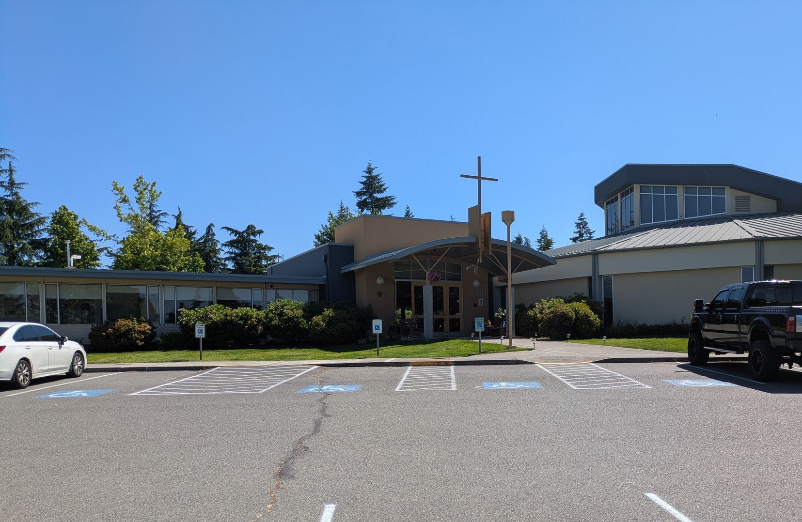 Handicapped parking spots in front of the church.