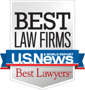 A badge that says best law firms us news best lawyers